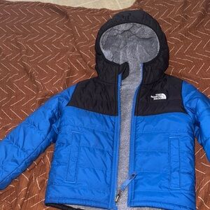 The North Face Black and Blue Jacket with Gray Lining